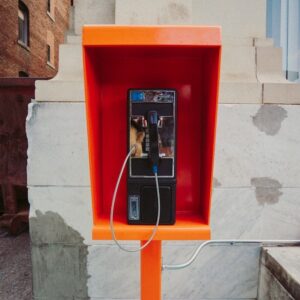 Payphone in an orange petistal
